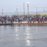 माघ मास 2026 में गंगा स्नान करते श्रद्धालु और भगवान विष्णु की पूजा