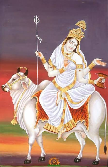 मां महागौरी की आरती करते हुए देवी महागौरी का दिव्य स्वरूप